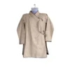 Close-up of beige Daura wrap top with black piping and tie knots