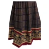 Hem detail of maroon bands and gold floral border on Nepali lehenga