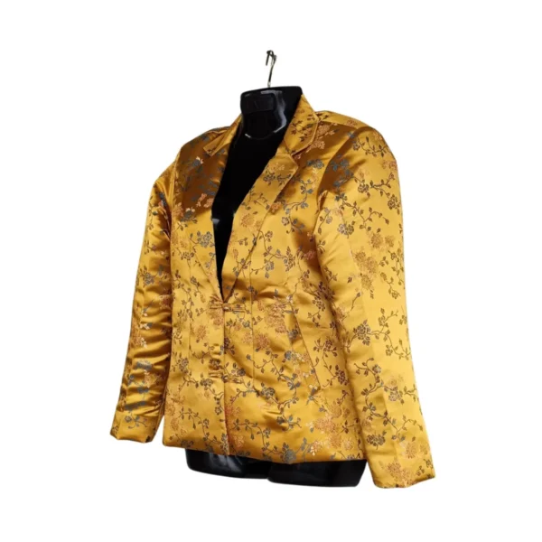 Side view of mustard brocade Kuchin coat with frog buttons