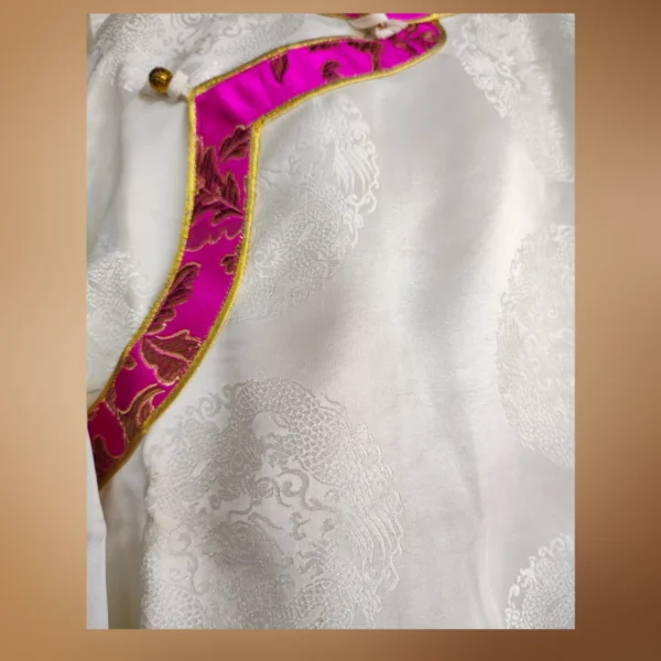 ivory jacquard round motifs with gold-piped pink border