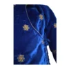 Close-up of royal blue velvet chaubandi cholo with gold butti and piping