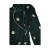 Detail of green velvet cholo showing side tie and piping