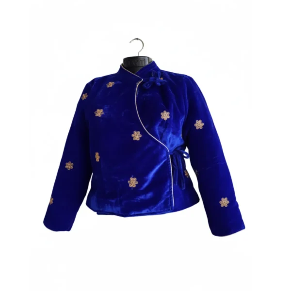 Front view of blue velvet chaubandi cholo with mandarin collar and motifs