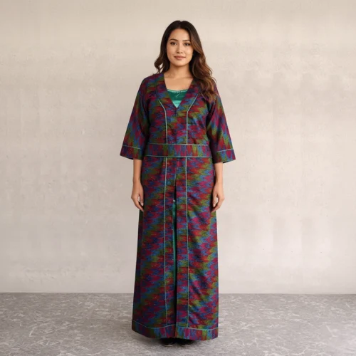 Woman wearing Teal subba set with open ikat robe