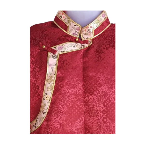 close up detail view of red jacquard Khenja with cream floral border