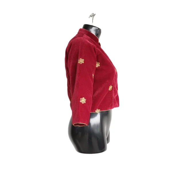 side view of maroon embroidered velvet blouse