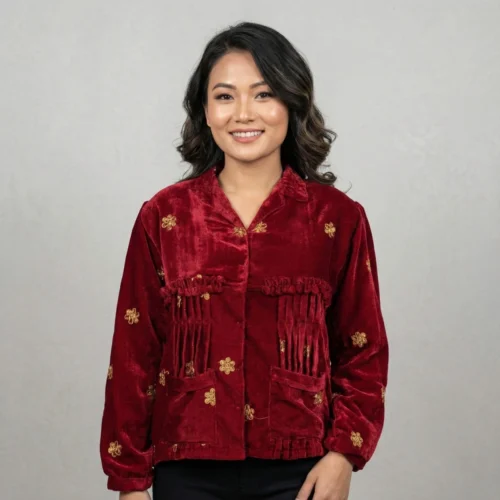 Woman wearing maroon velvet Rai Cholo