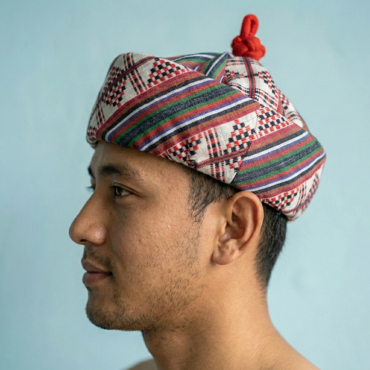 Lepcha Topi for men — fully woven geometric patterned hat in ochre maroon and cream