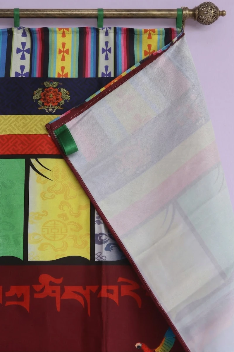 Close up view of Dimension size of Tibetan door curtain with caparisoned elephant, monkeys, and parrots on maroon wildlife motif