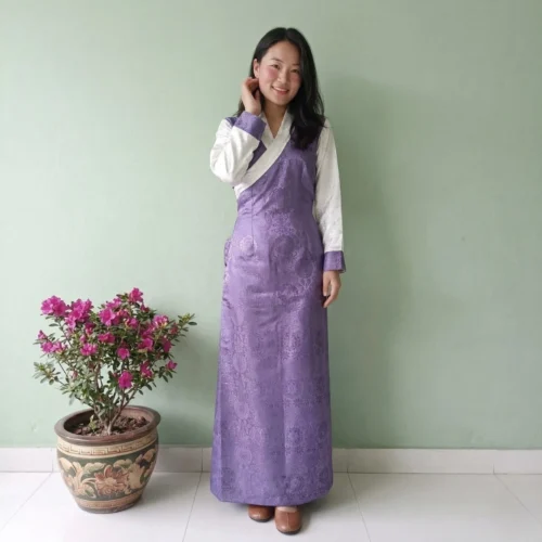 Girl wearing purple jacquard one piece bakhu