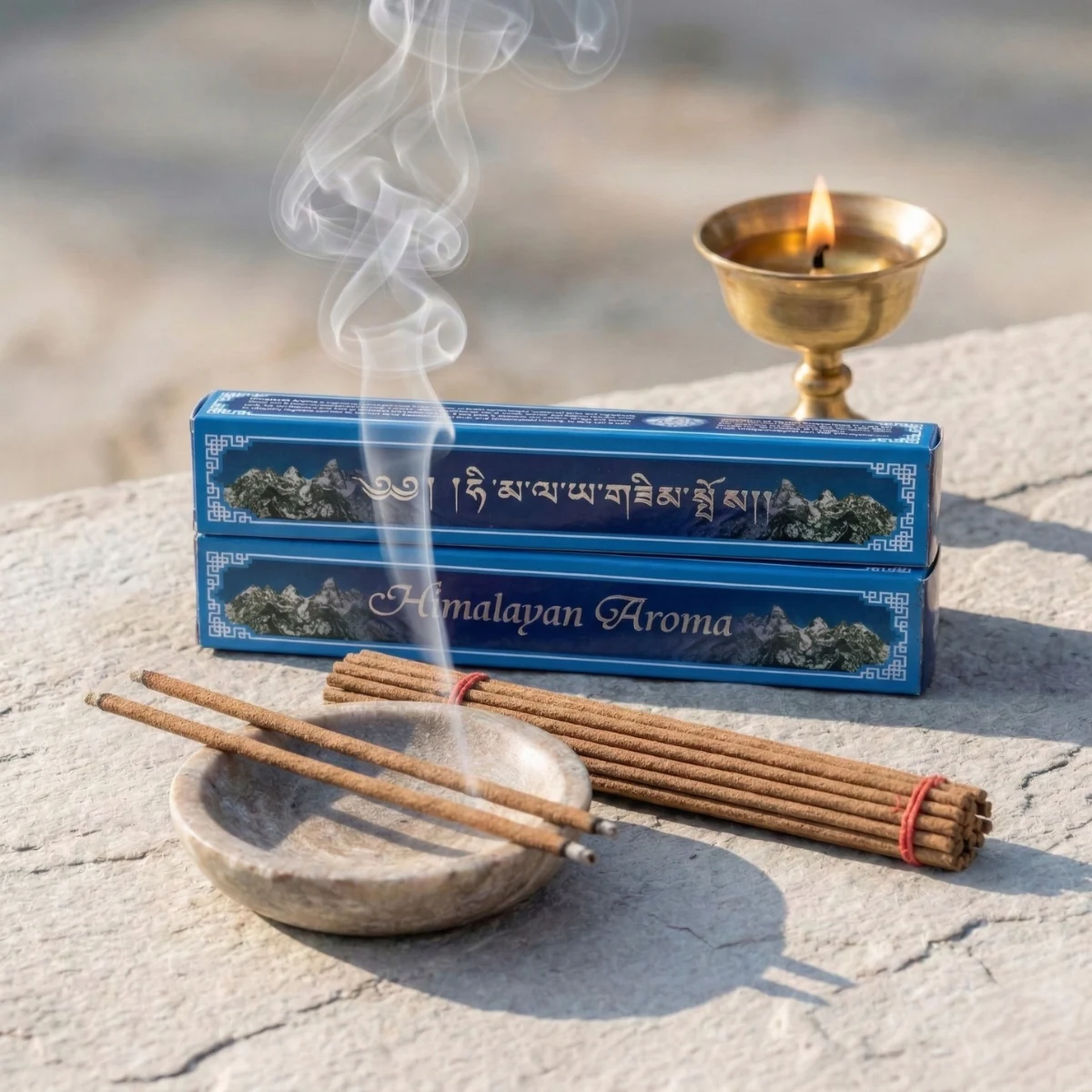 Himalayan Aroma incense pack of 2 showing Tibetan Uchen script packaging with burning stick