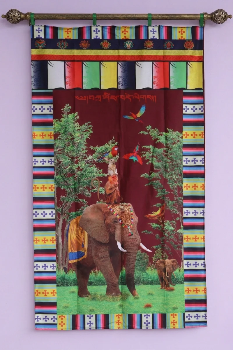 Tibetan door curtain with caparisoned elephant, monkeys, and parrots on maroon — auspicious wildlife motif