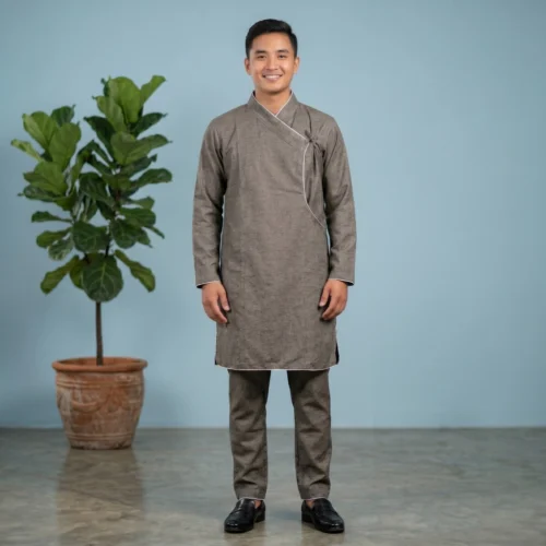 Man in Charcoal Daura Suruwal set with white piping full body shot