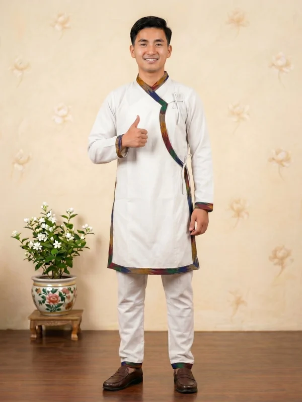Man in White Dhaka trim Daura Suruwal set full body lifestyle shot