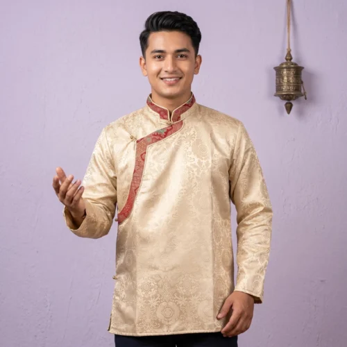Man wearing beige jacquard Khenja with red Tash Kuchin border front view