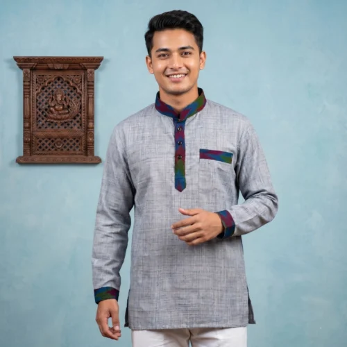 Man wearing grey shirting cotton Nepali Shirt with Dhaka trim full body front lifestyle shot