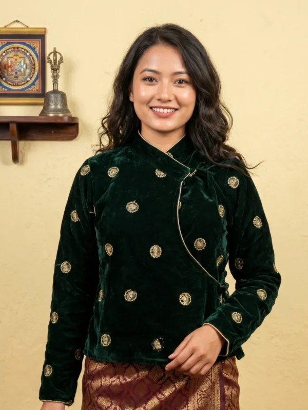 Woman wearing Deep green velvet Chaubandi Cholo with gold butti front view