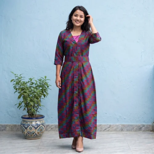 Woman wearing Magenta Subba Set cotton ikat gown dress open ikat layer full body side front view