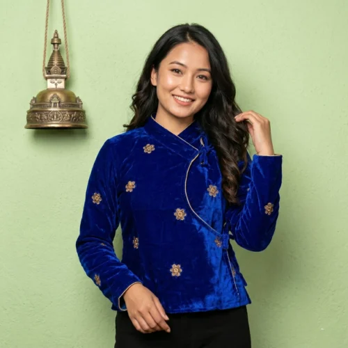 Woman wearing Royal blue velvet Chaubandi Cholo with gold butti front view