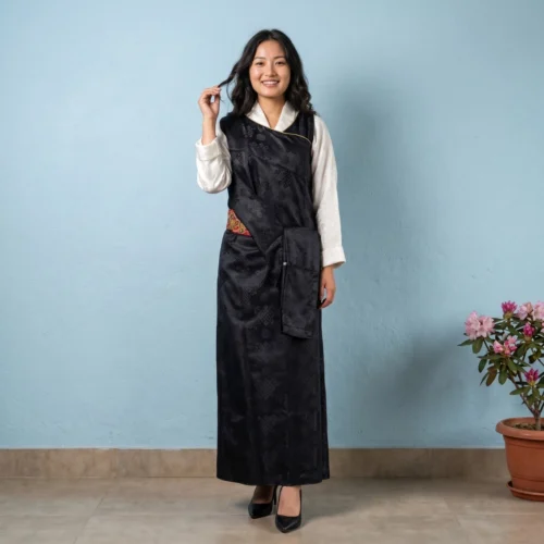 Woman wearing black Lepcha Gada wrap dress front view full length