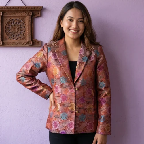 Woman wearing maroon Tash Kuchin coat