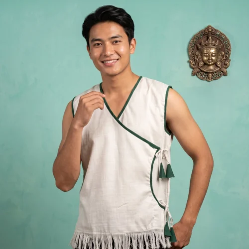 Man wearing white cotton fenga jacket with green trim front view