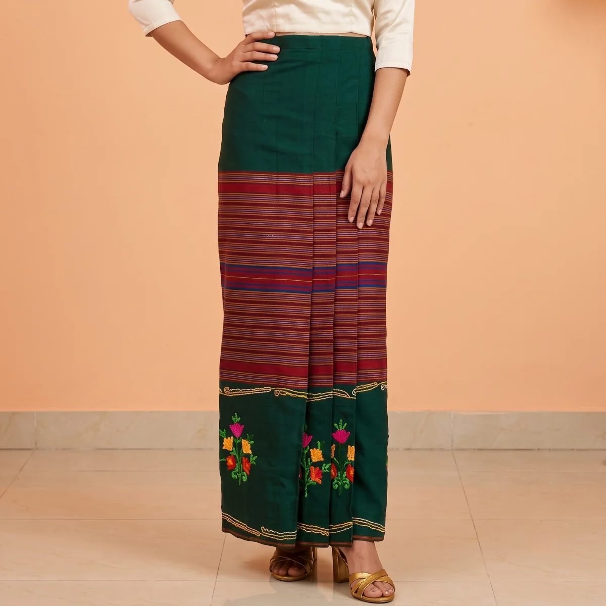Embroidered Tamang Wrapper — Women's Phariya Skirt 3 Green tamang phariya skirt stripe band and pleats front close-up