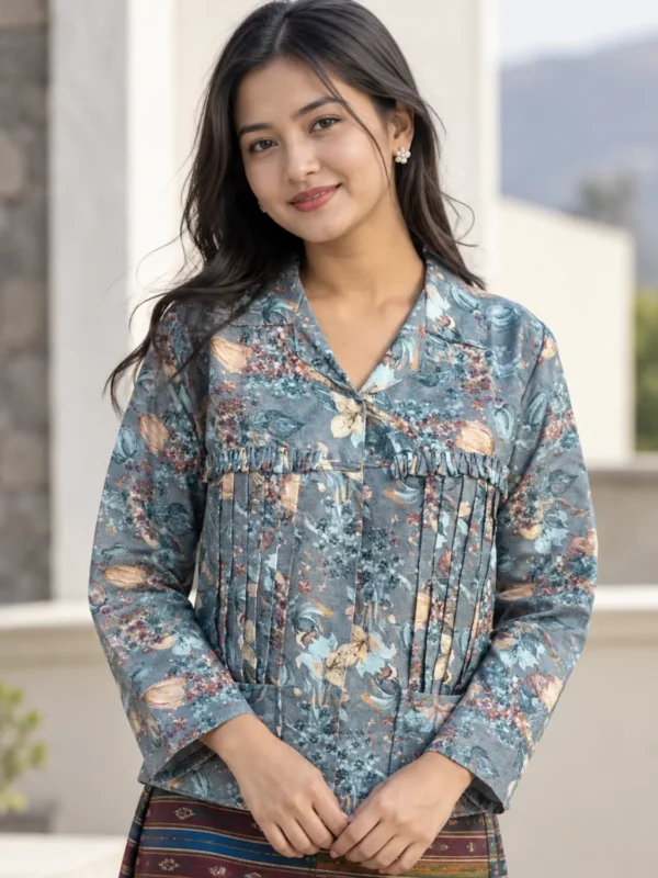 Woman wearing slate blue floral cotton rai cholo for women, front view