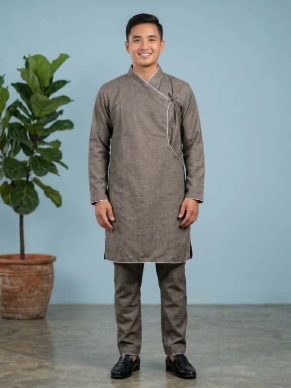 Man in Charcoal Daura Suruwal set with white piping full body shot