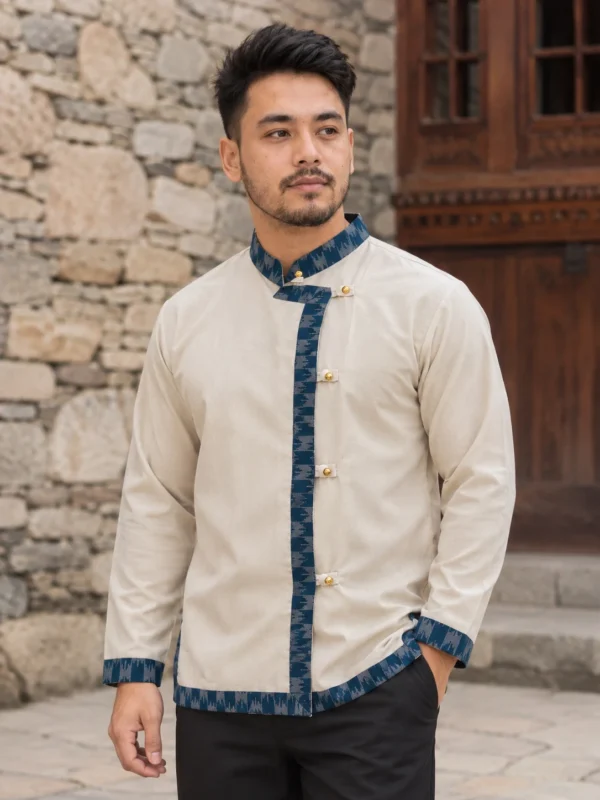 Man wearing cream daura shirt for men with blue dhaka border front view