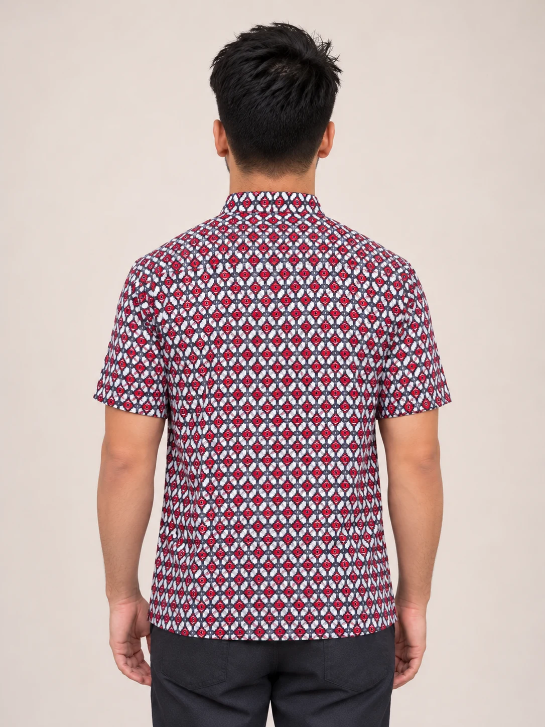 Half Sleeve Nepali Shirt for Men in Dhaka Print Cotton 5 Man wearing red and navy dhaka print short sleeve shirt back view