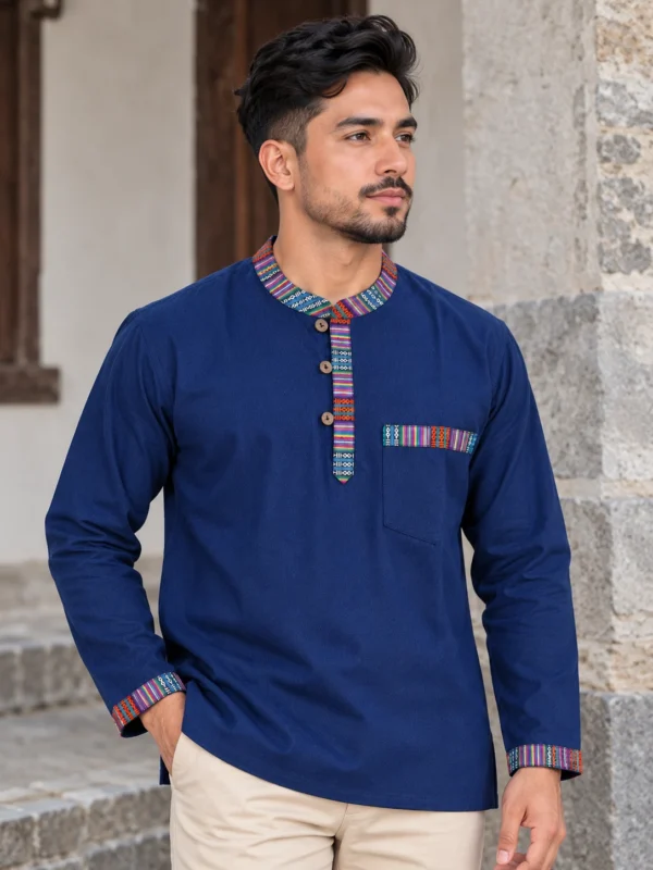 Man wearing royal blue khadi nepali shirt for men with dhaka trim front view