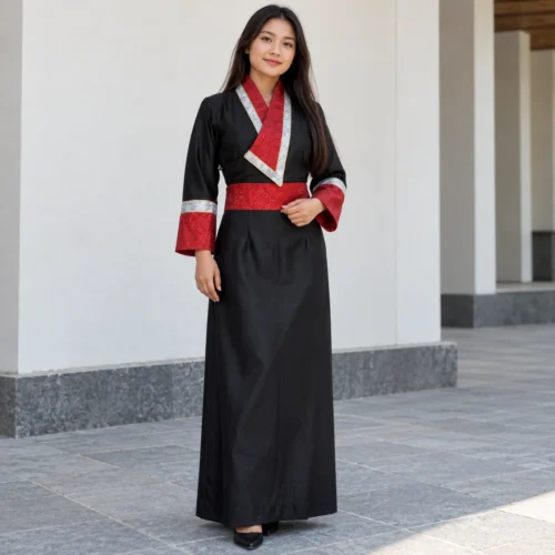 Tibetan dress for women in black suiting with red kuchin belt front view