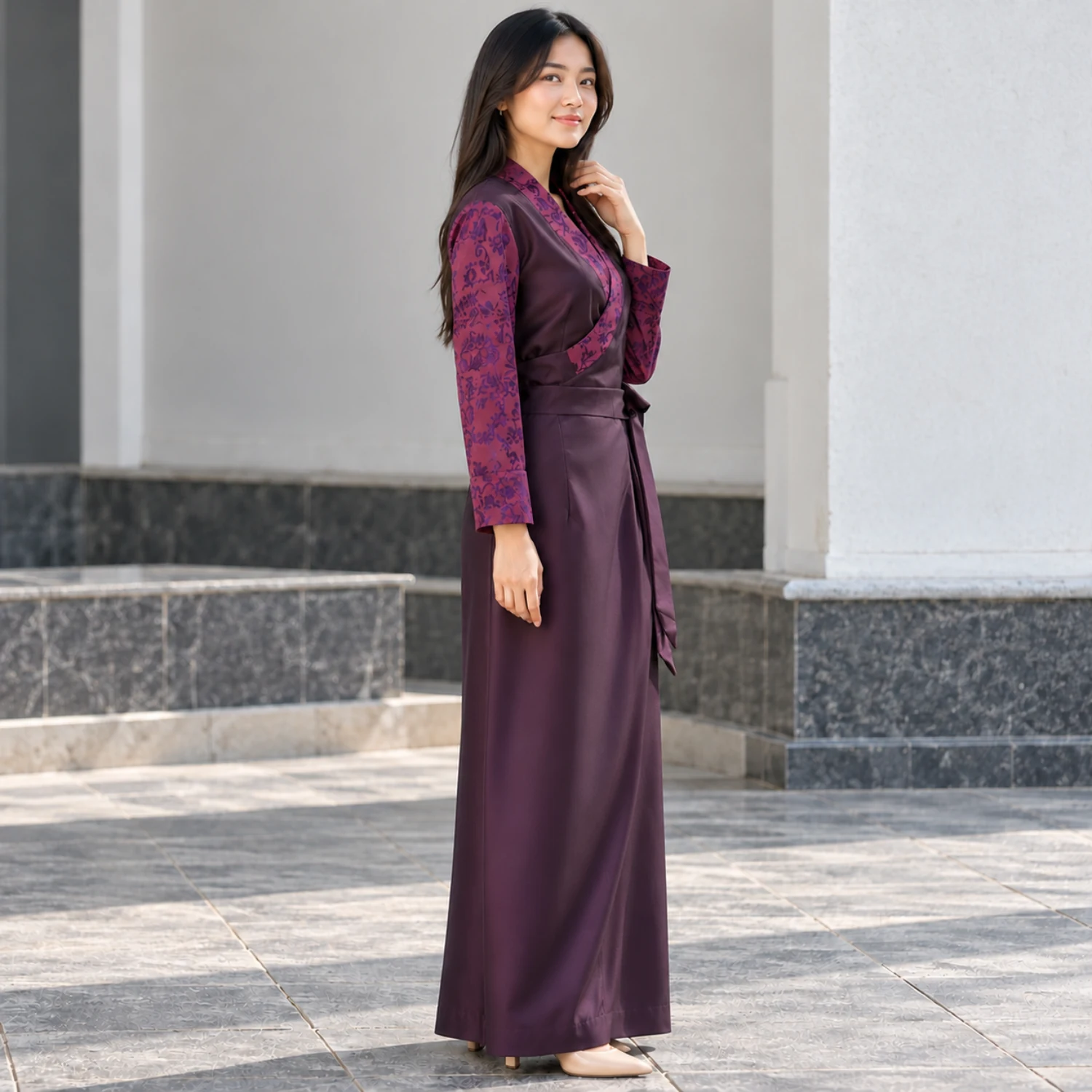 Bhutia Bakhu Dress with Floral Honju Sleeves 2 Woman in plum suiting bakhu with floral sleeves full length view
