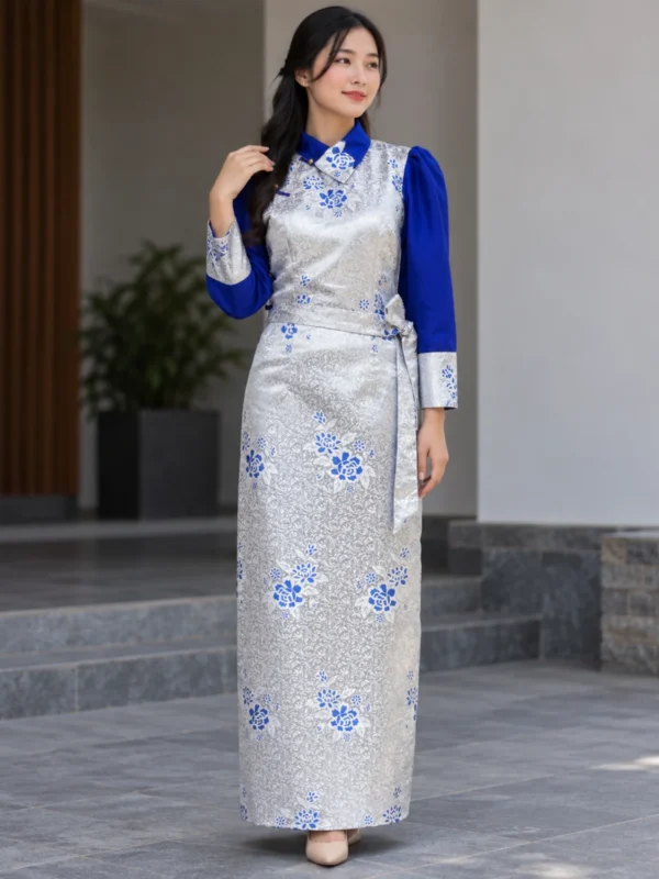 Woman wearing chinese bakhu in silver brocade with royal blue sleeves front view