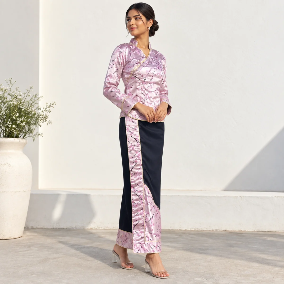 Brocade Tamang Wrapper Set — Wrap Top & Phariya Skirt 1 Woman wearing pink brocade tamang wrapper set front view
