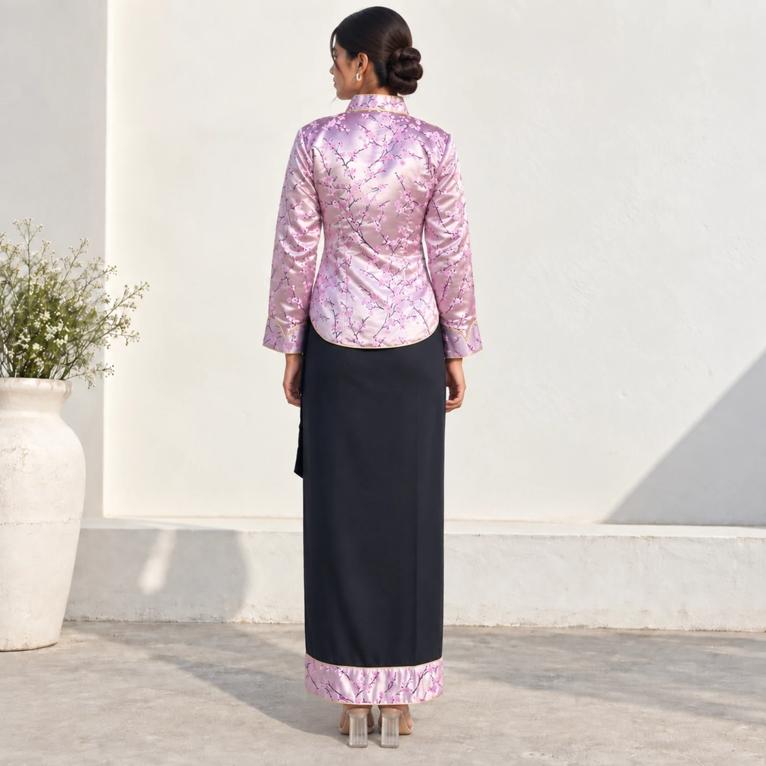 Brocade Tamang Wrapper Set — Wrap Top & Phariya Skirt 4 Woman wearing Pink brocade wrap top and phariya skirt back view