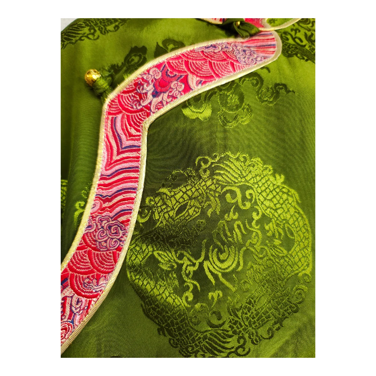 green Khenja with pink patterned border and knot button