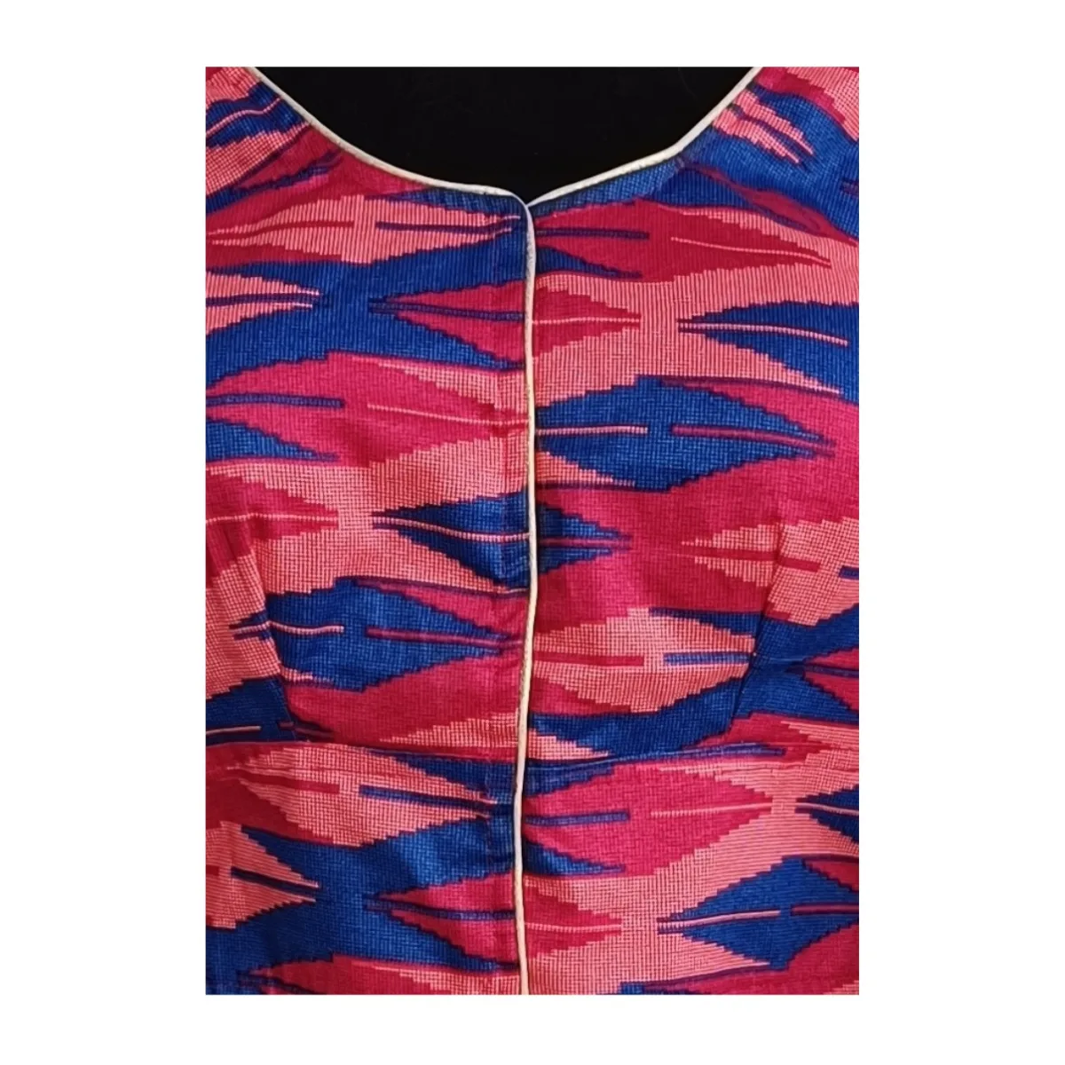 Close up detail of Subba Limbu cotton blouse in pink and blue Close up detail of Subba Limbu cotton blouse in pink and blue