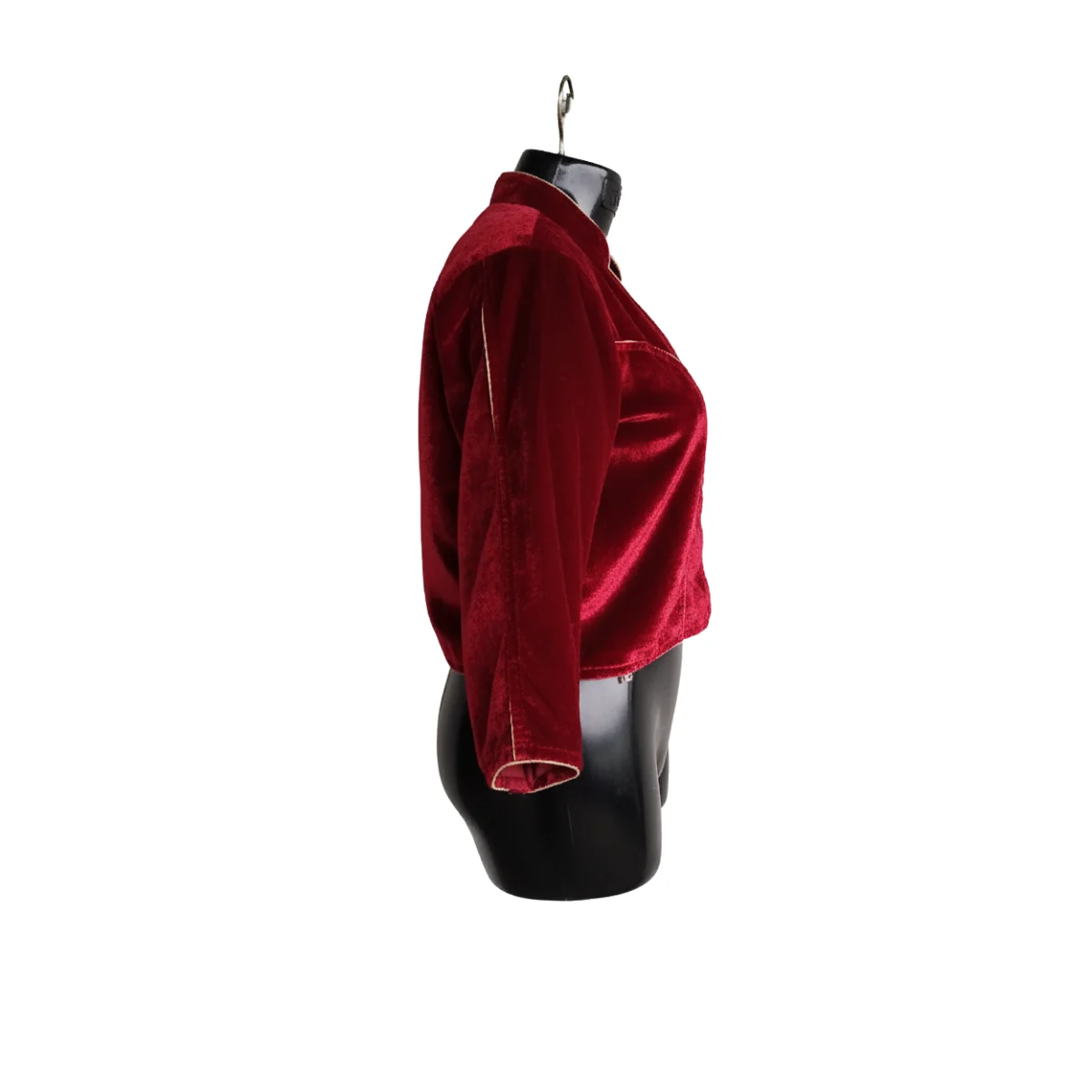 Side profile of maroon micro-velvet blouse with 3:4 sleeves